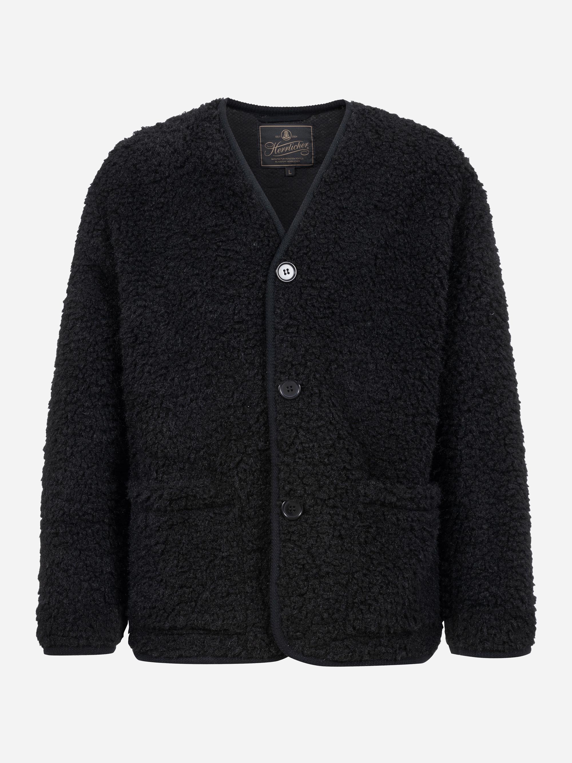 Modell  Tharkay Cardigan aus Sherpa Fleece